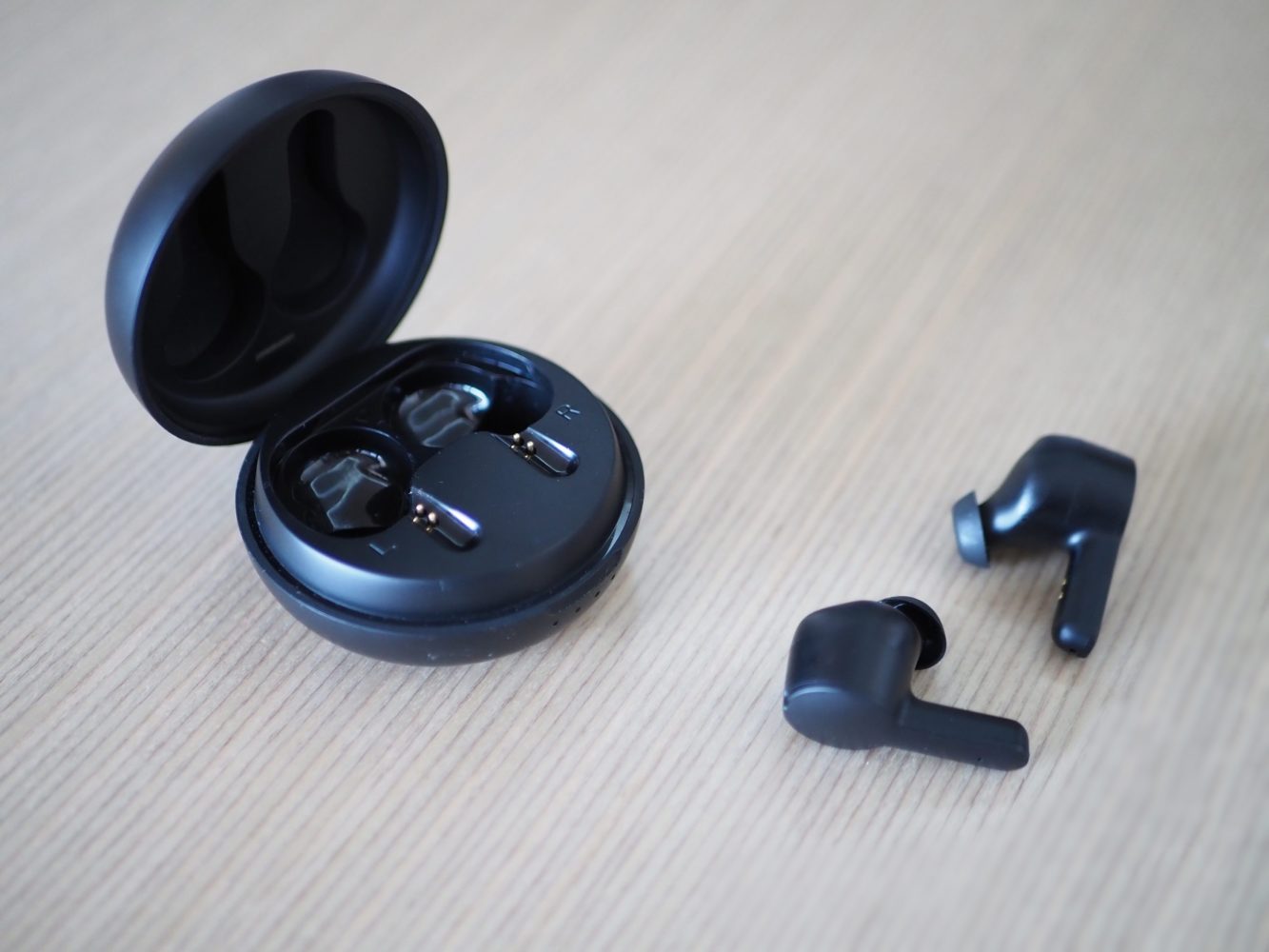 Tribit FlyBuds NC Manual - How to charge the earbuds?